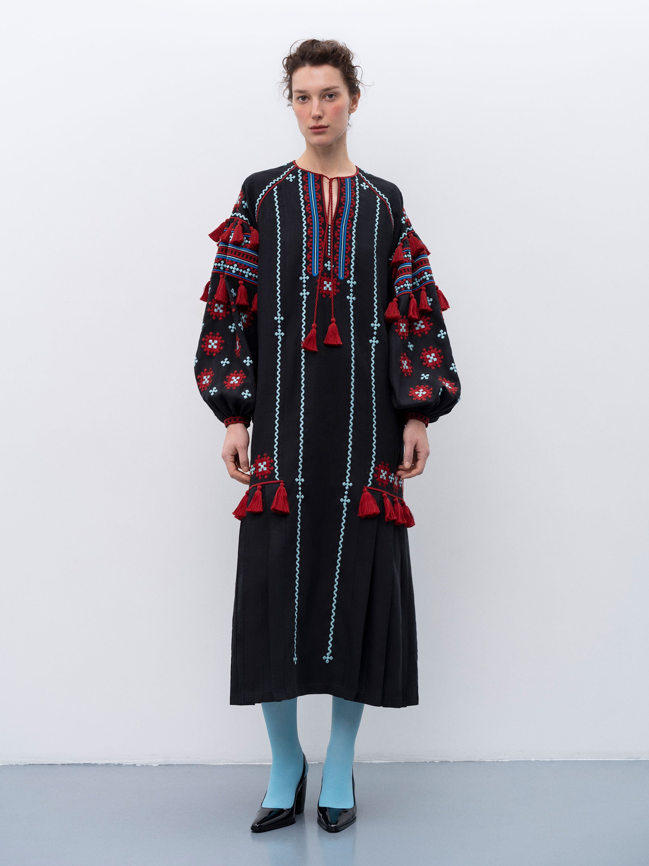 Black linen embroidered dress with contrasting ornaments and tassels Tera