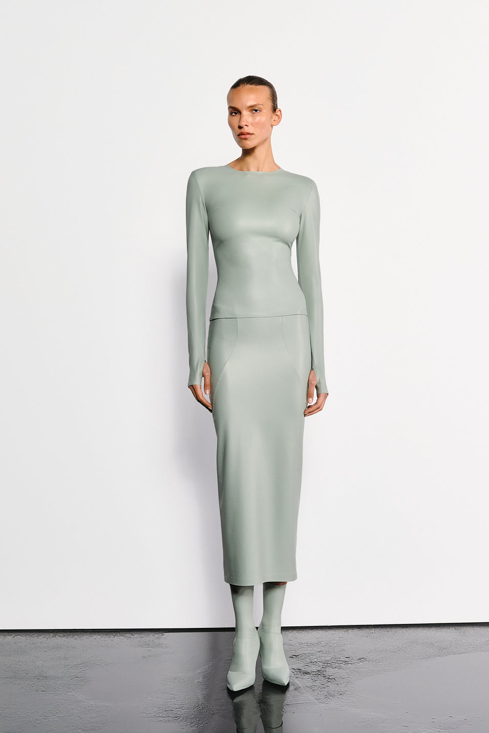 VEGAN LEATHER SCULPTING MIDI SKIRT